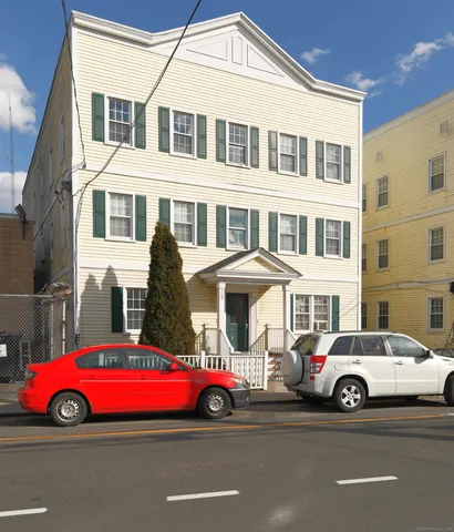 a car parked in front of a house