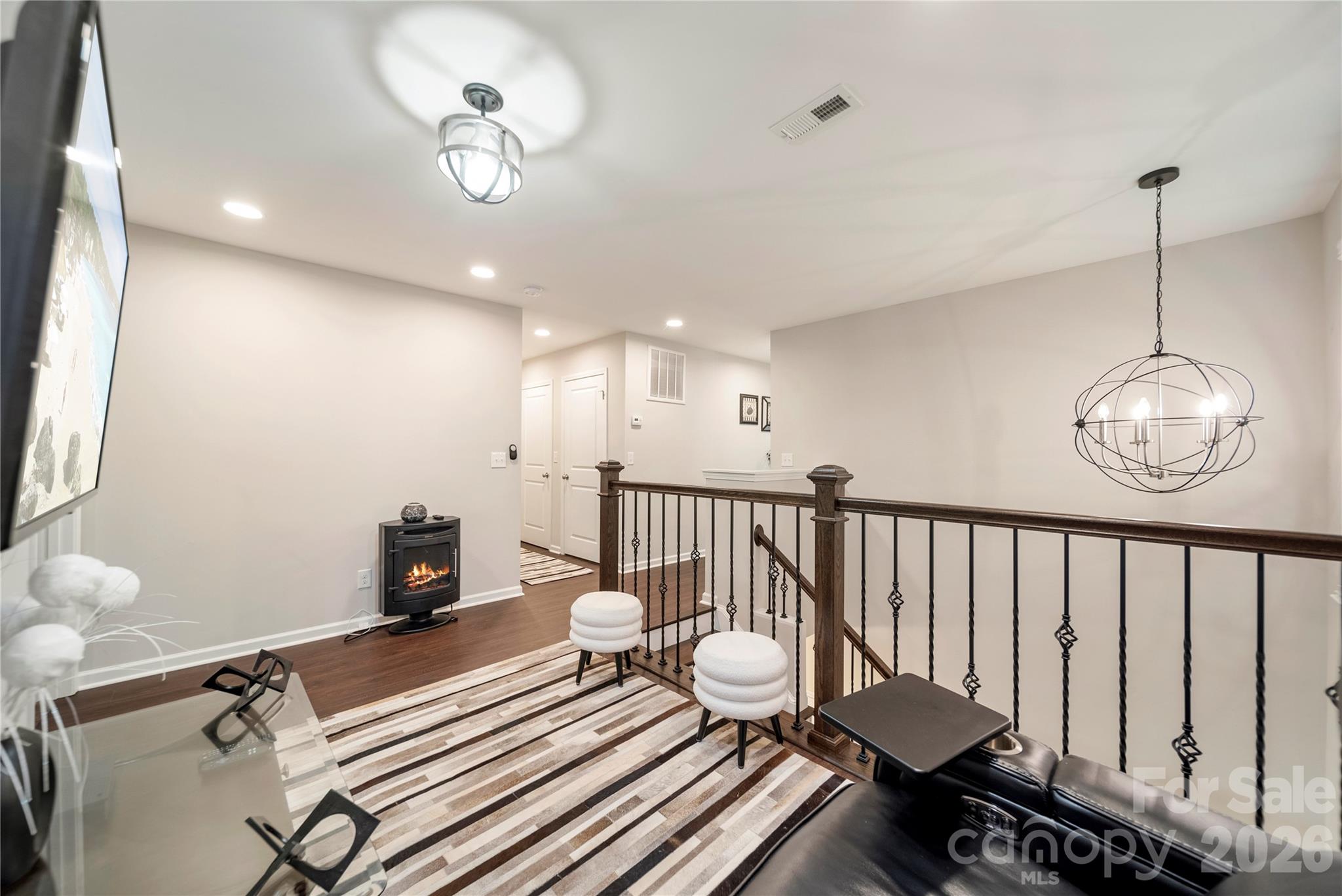 8122 Mossy Rock Road Waxhaw, NC 28173 - Photo 13 of 28 a view of a room with furniture wooden floor and window