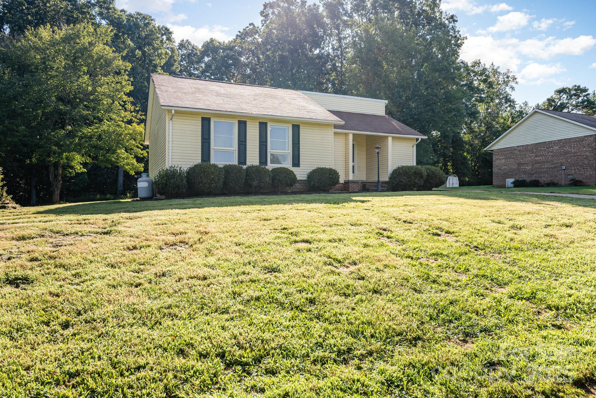 152 Sparrow Road Statesville, NC 28625 - Photo 15 of 28 a front view of a house with a yard