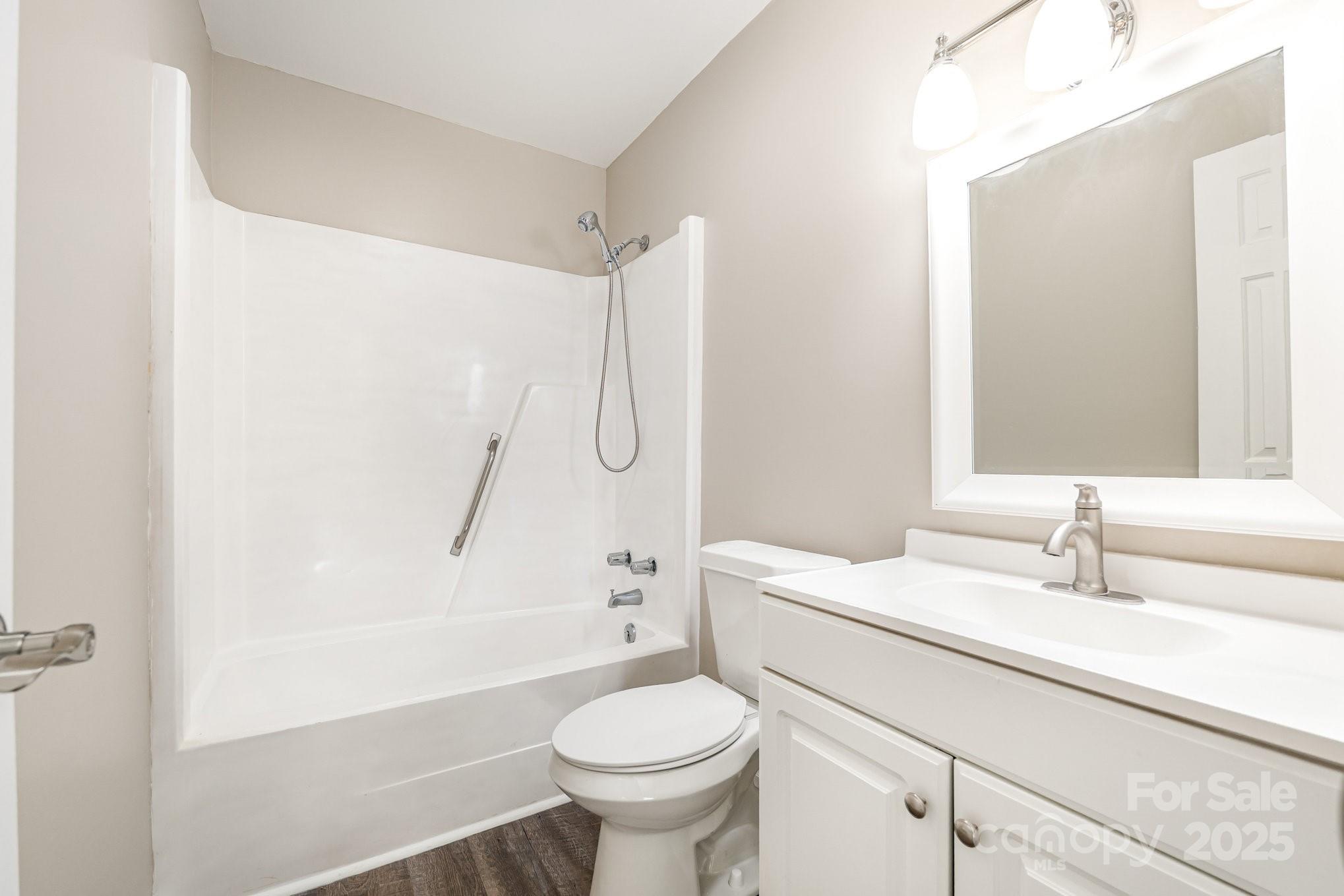 152 Sparrow Road Statesville, NC 28625 - Photo 24 of 28 a bathroom with a sink toilet and shower