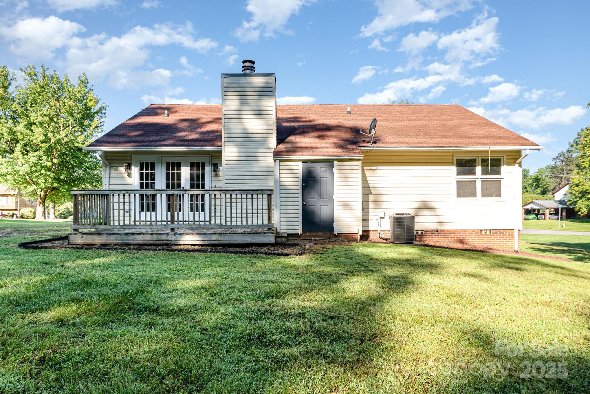 152 Sparrow Road Statesville, NC 28625 - Photo 28 of 28 a view of a house with a backyard and a patio
