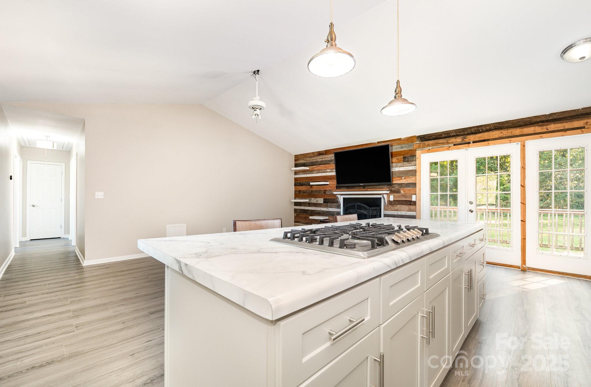 152 Sparrow Road Statesville, NC 28625 - Photo 8 of 28 a kitchen with a stove and a microwave