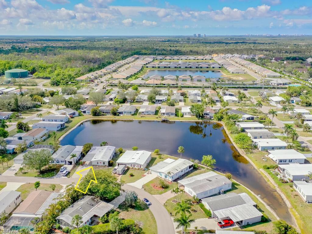 269 Riverwood Road Naples, FL 34114 - Photo 25 of 32 a view of a balcony with an ocean view