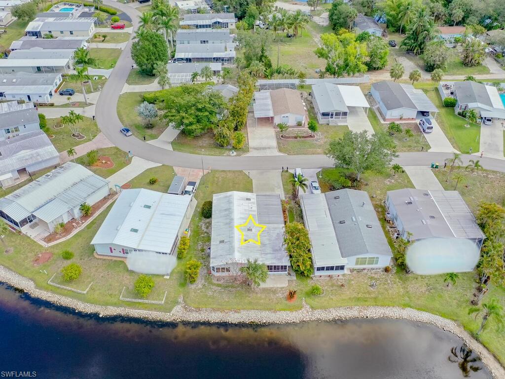 269 Riverwood Road Naples, FL 34114 - Photo 28 of 32 an aerial view of residential houses with outdoor space
