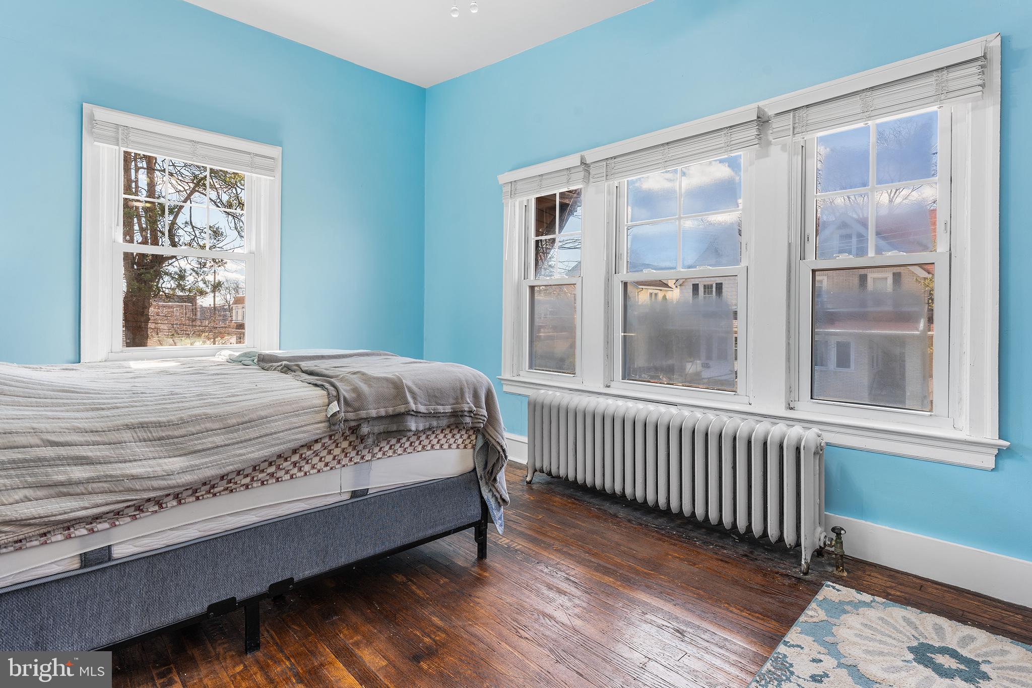 295 Braddock Avenue Lansdowne, PA 19050 - Photo 17 of 36 a bed sitting in a bedroom next to a window