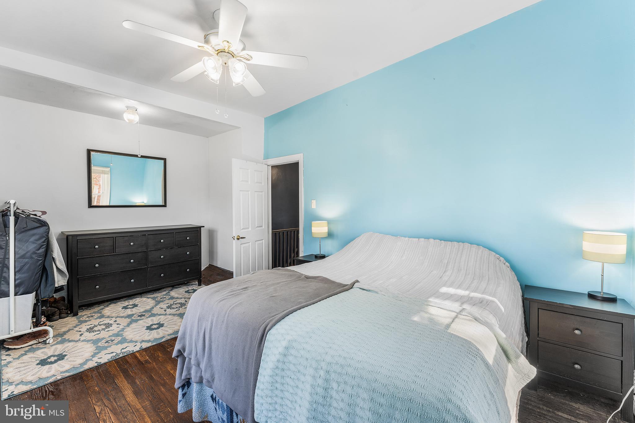 295 Braddock Avenue Lansdowne, PA 19050 - Photo 19 of 36 a bedroom with a bed and a dresser