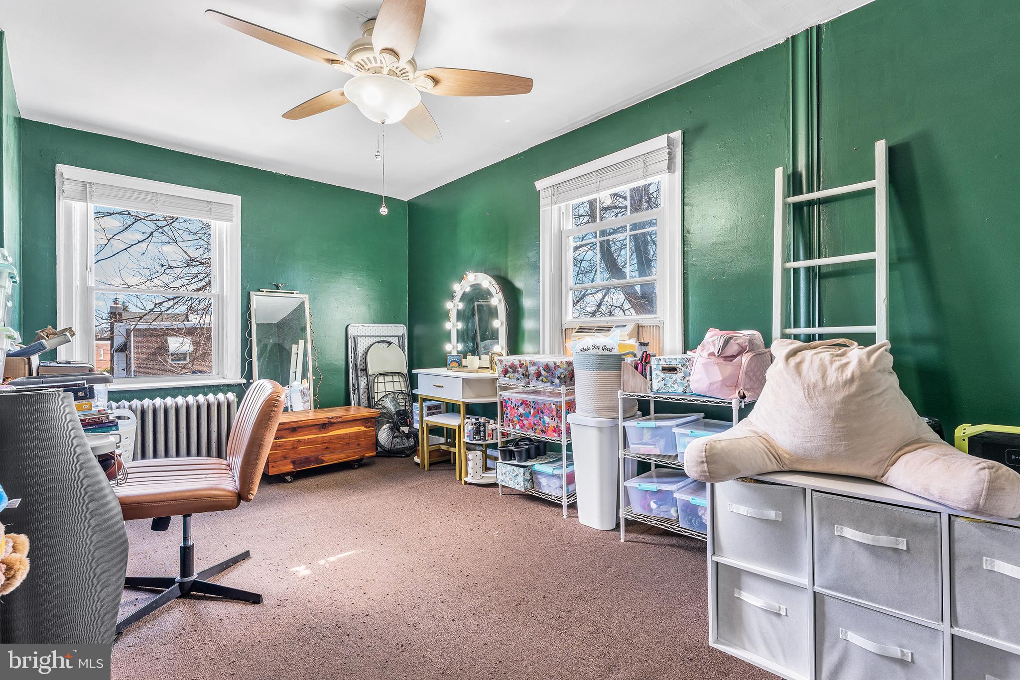 295 Braddock Avenue Lansdowne, PA 19050 - Photo 23 of 36 a living room with furniture and a window