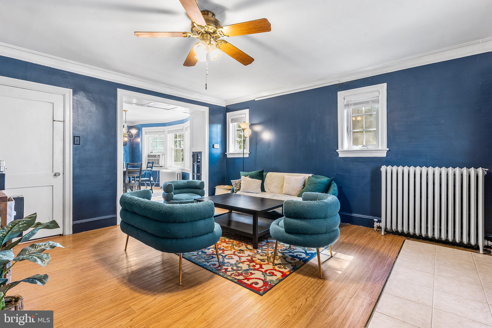 295 Braddock Avenue Lansdowne, PA 19050 - Photo 4 of 36 a living room with furniture and a rug