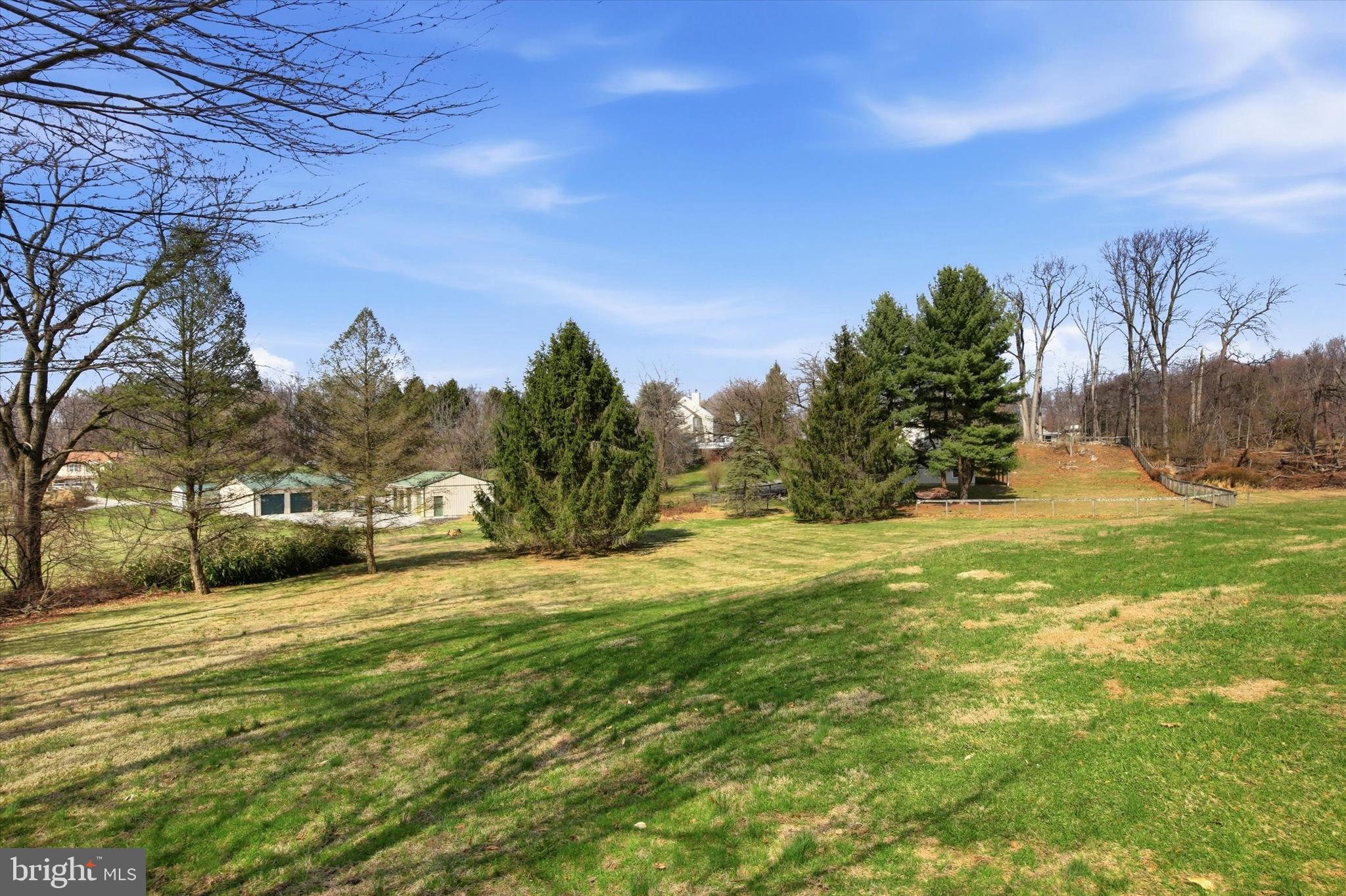 1307 Jaine Lane Spring City, PA 19475 - Photo 36 of 47 a view of a field of grass and trees