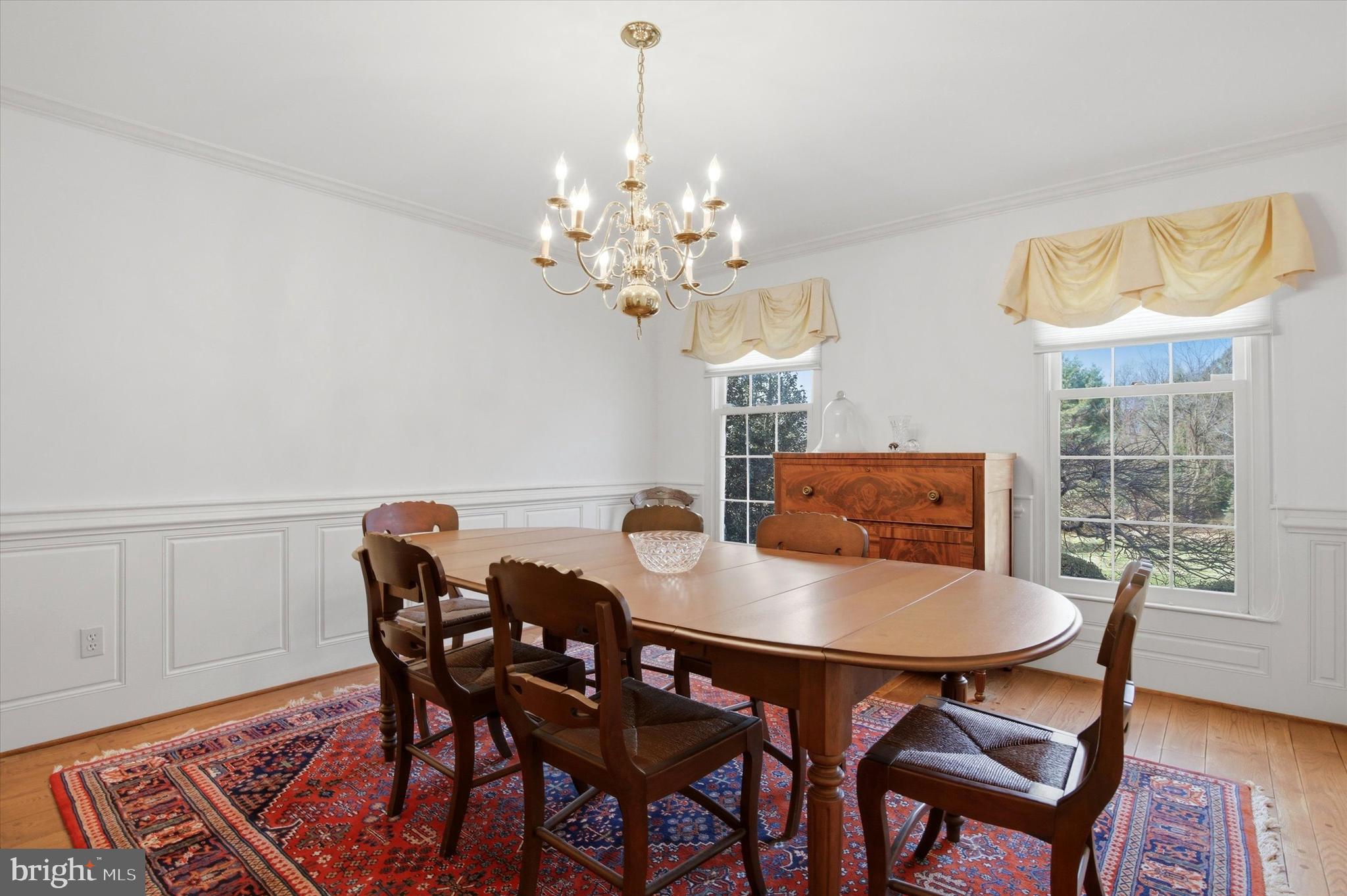 1307 Jaine Lane Spring City, PA 19475 - Photo 7 of 47 a view of a dining room with furniture window and wooden floor