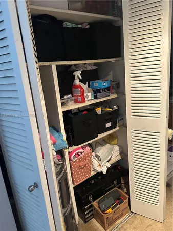 a room with storage and utility