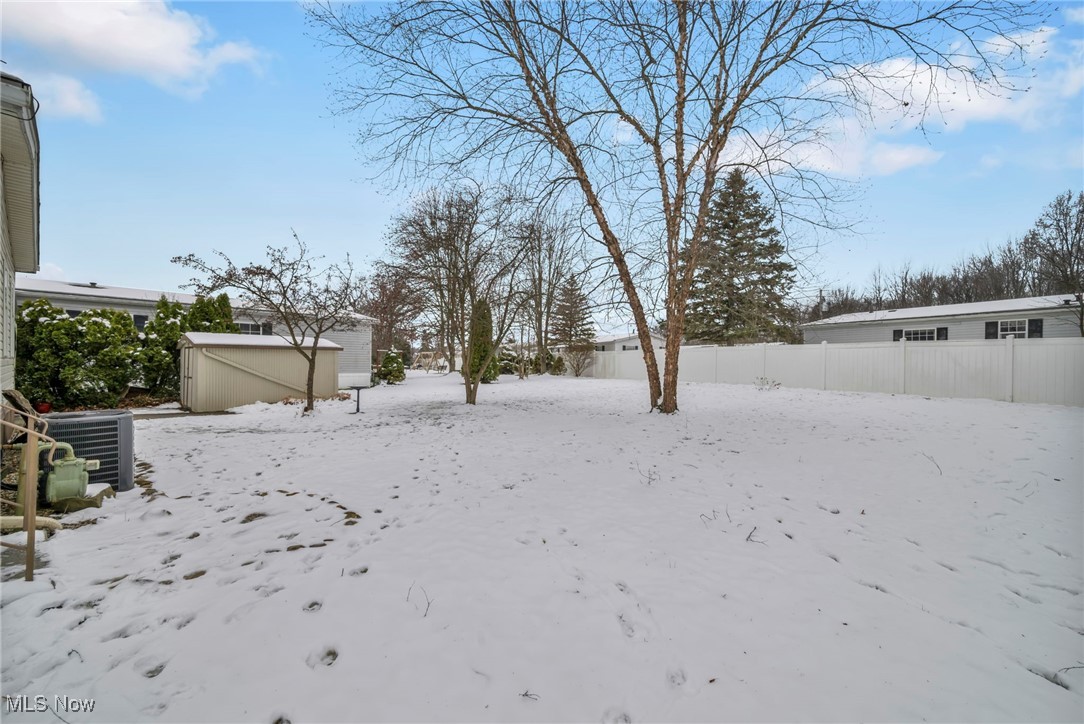 27202 Cook Road, Unit 95 Olmsted Falls, OH 44138 - Photo 41 of 46 View of yard covered in snow