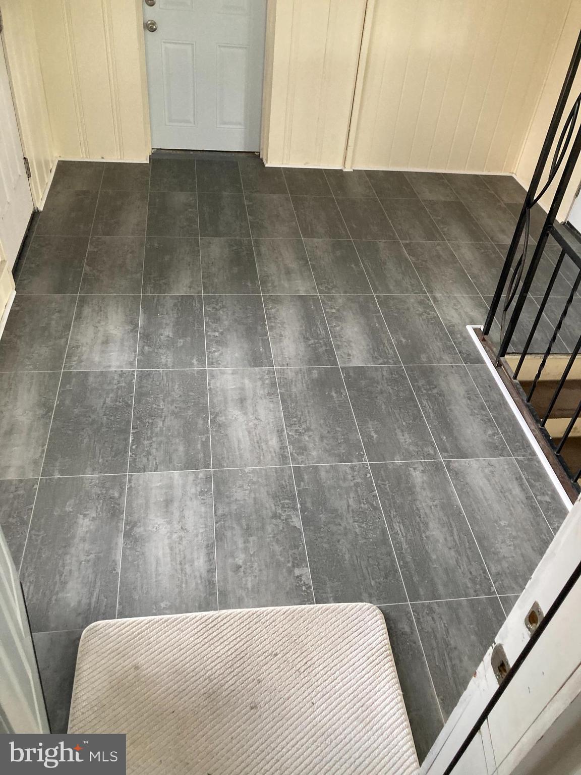 4 Hampton Road Linthicum Heights, MD 21090 - Photo 21 of 38 Foyer featuring updated tile flooring and stairs