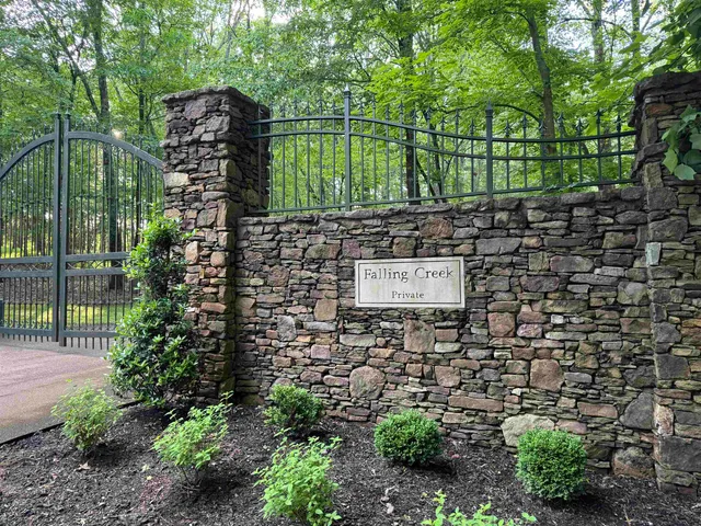 an aerial view of a golf course with parking space