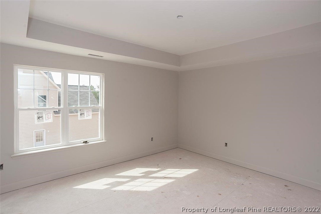 185 Sandy Springs Road Aberdeen, NC 28315 - Photo 17 of 21 a view of an empty room with a window