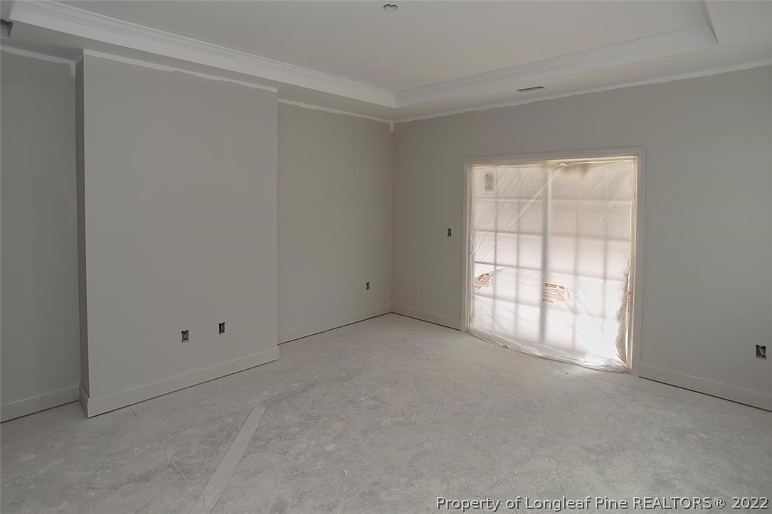 185 Sandy Springs Road Aberdeen, NC 28315 - Photo 8 of 21 a view of an empty room with a window