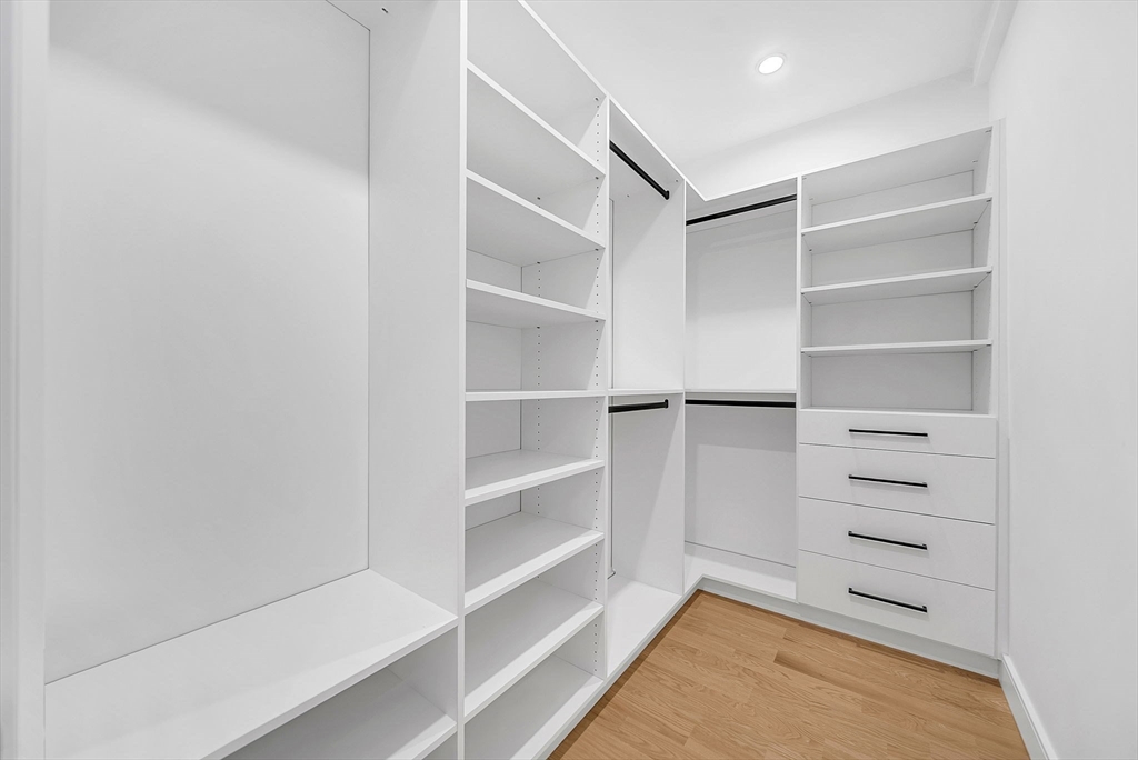 282 Nevada Street, Unit 282 Newton, MA 02460 - Photo 12 of 30 a view of an empty walk in closet