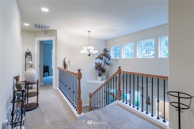 a view of a hallway with bedroom