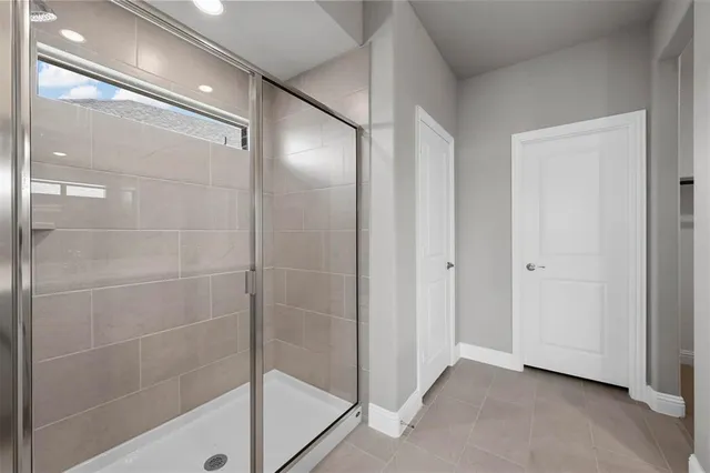 a bathroom with a double vanity sink and mirror