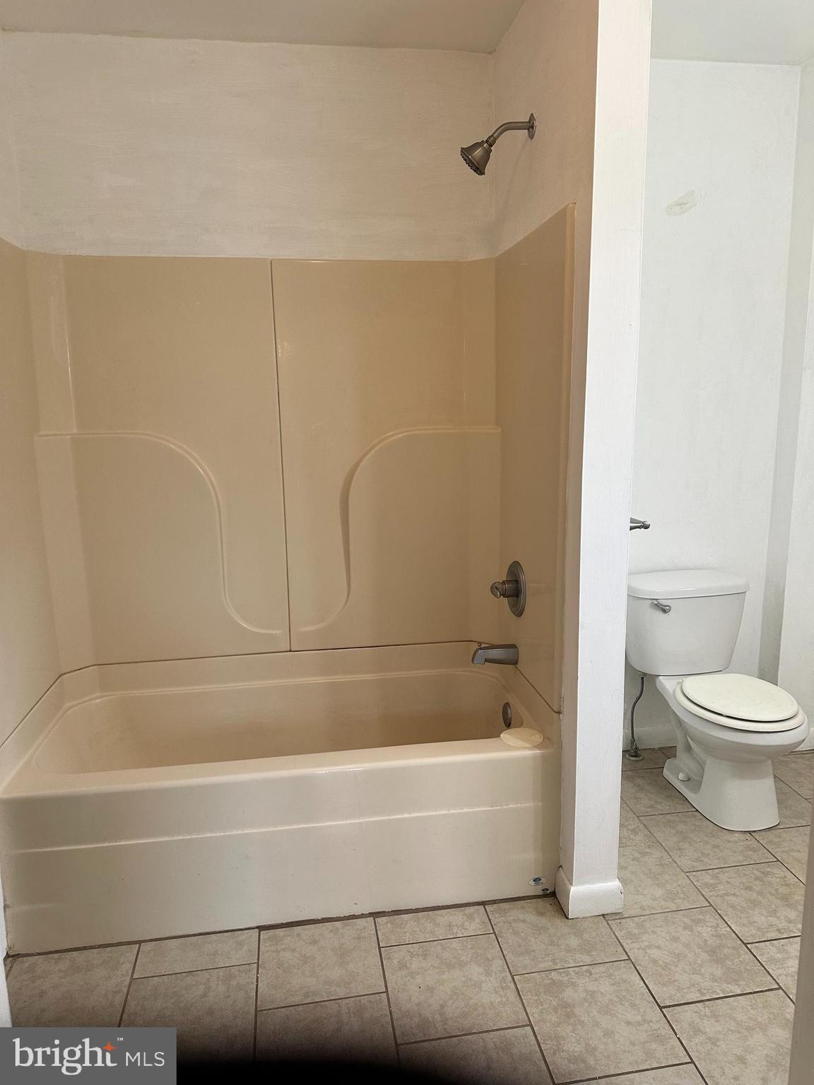102 Myrtle Avenue Reading, PA 19606 - Photo 10 of 11 a bathroom with a toilet and a bathtub