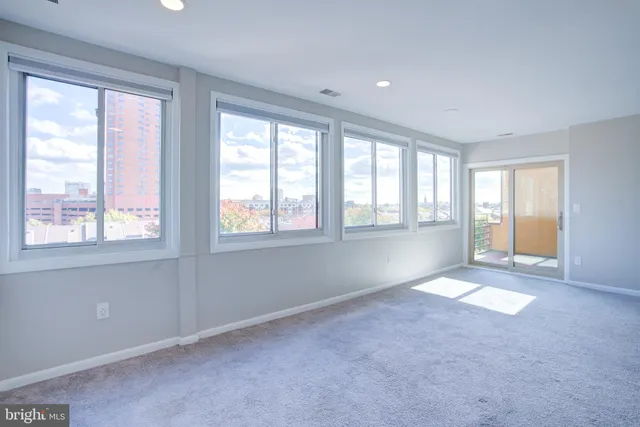 an empty room with windows