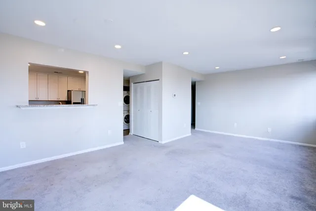 a big room with windows and closet