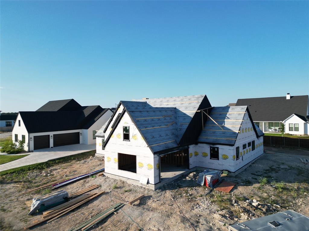 11010 King's Canyon Woodway, TX 76712 - Photo 2 of 7 a view of house with outdoor space and sitting area