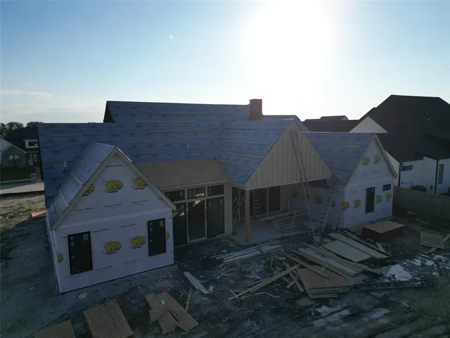 a view of house with yard