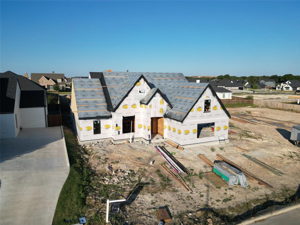 11010 King's Canyon Woodway, TX 76712 - Photo 5 of 7 a view of house with yard