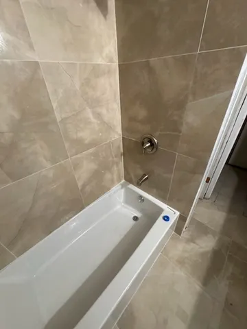 a bathroom with a tub