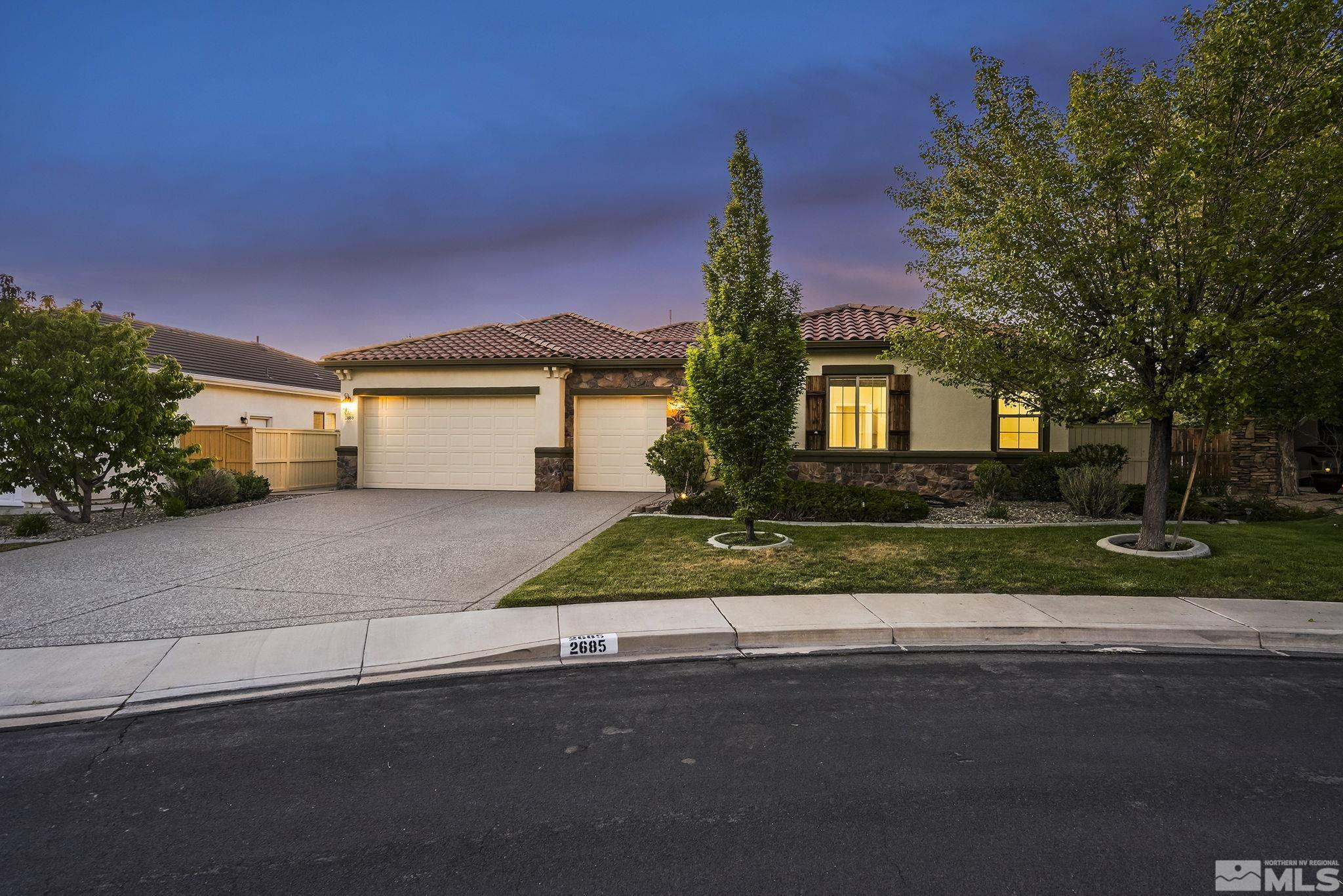 2685 Alder Bridge Court Reno, NV 89521 - Photo 1 of 38 front view of house with a yard and trees