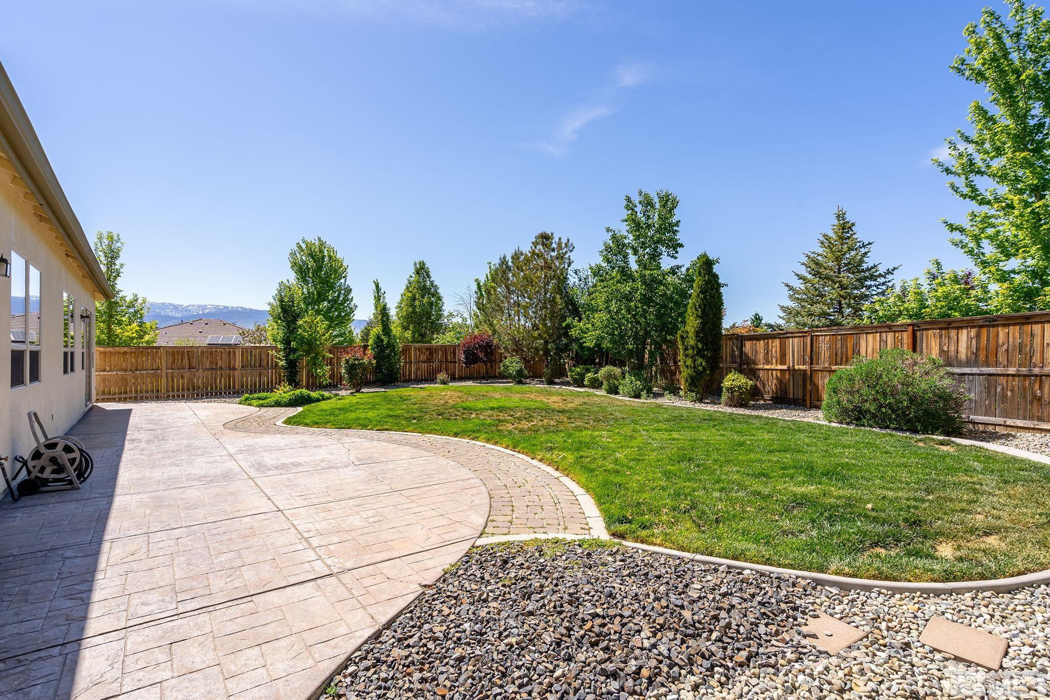 2685 Alder Bridge Court Reno, NV 89521 - Photo 23 of 38 a view of a backyard
