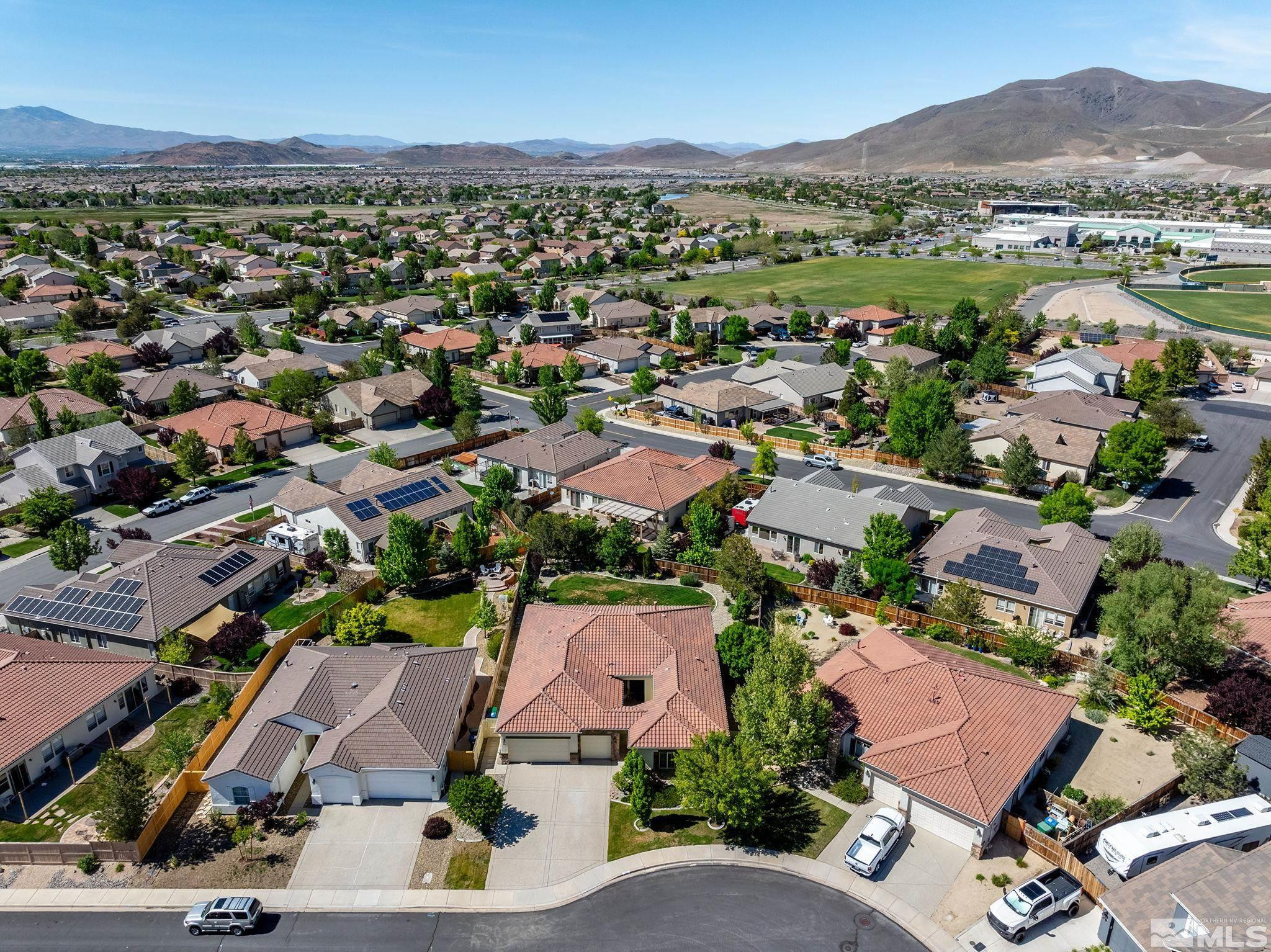 2685 Alder Bridge Court Reno, NV 89521 - Photo 33 of 38 an aerial view of residential houses with outdoor space