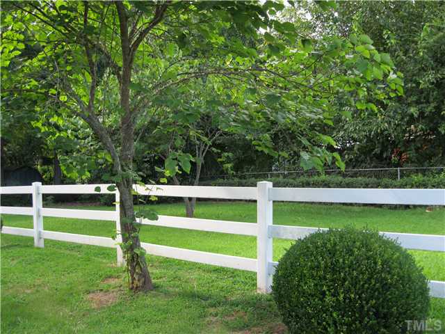 408 Fletcher Drive Raleigh, NC 27603 - Photo 18 of 22 a view of a park with large trees