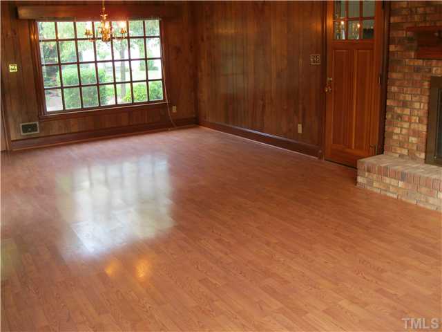 408 Fletcher Drive Raleigh, NC 27603 - Photo 7 of 22 a view of an empty room with a window