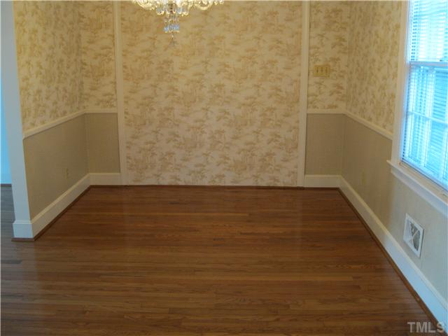 408 Fletcher Drive Raleigh, NC 27603 - Photo 9 of 22 a view of a room with wooden floor and a window