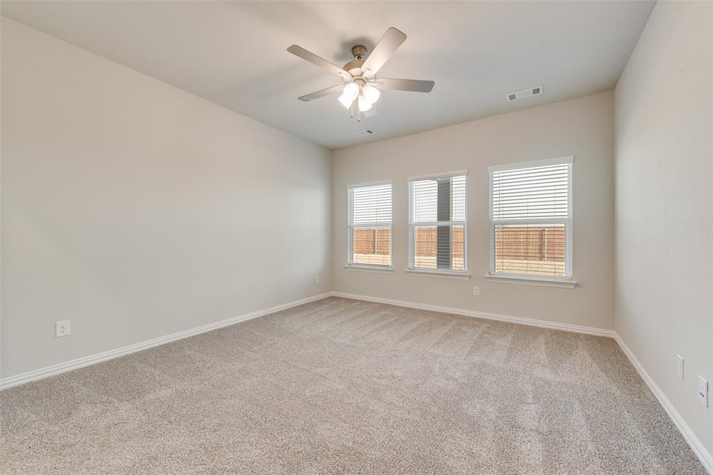 232 Sutter Mill Road Saginaw, TX 76131 - Photo 17 of 24 a view of an empty room with a window