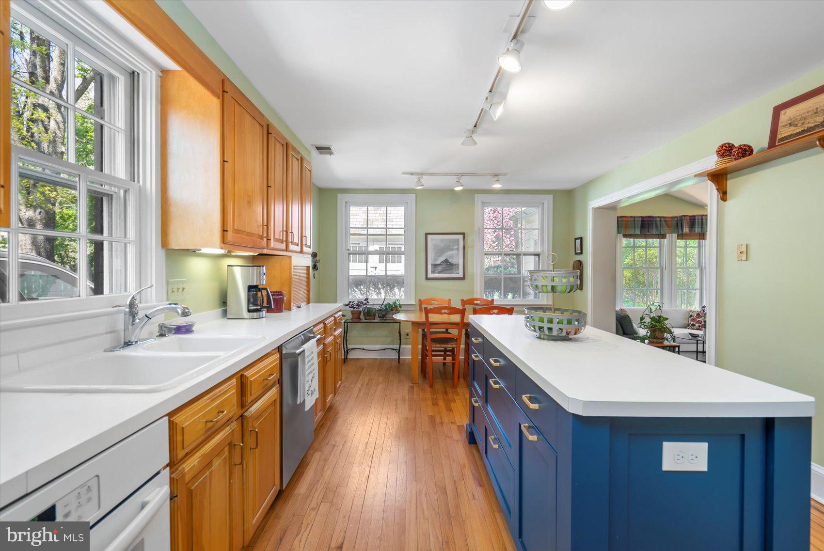 600 Somerset Road Baltimore, MD 21210 - Photo 12 of 59 a kitchen with a sink a counter top space and stainless steel appliances