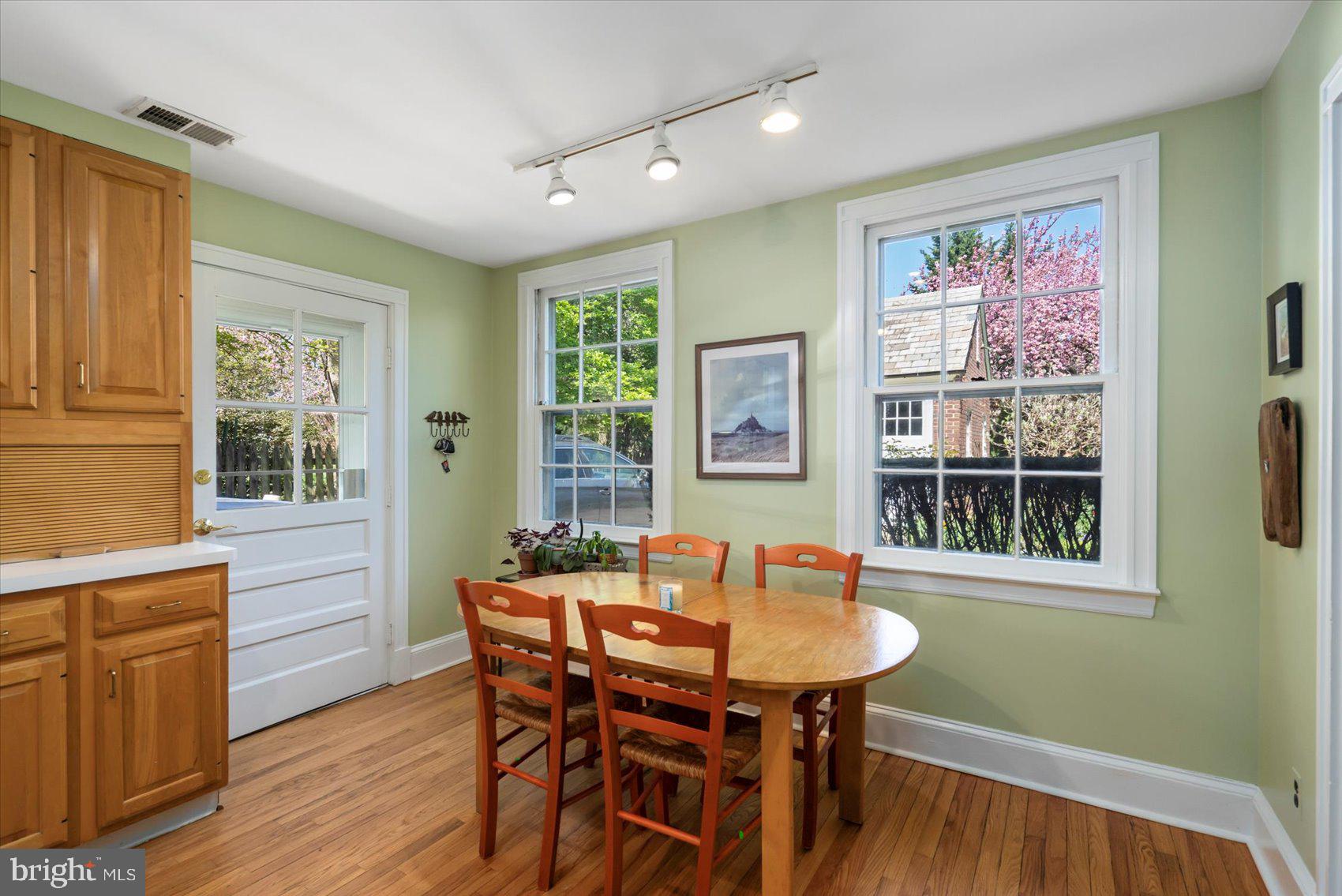 600 Somerset Road Baltimore, MD 21210 - Photo 18 of 59 a view of a dining room with furniture window and wooden floor