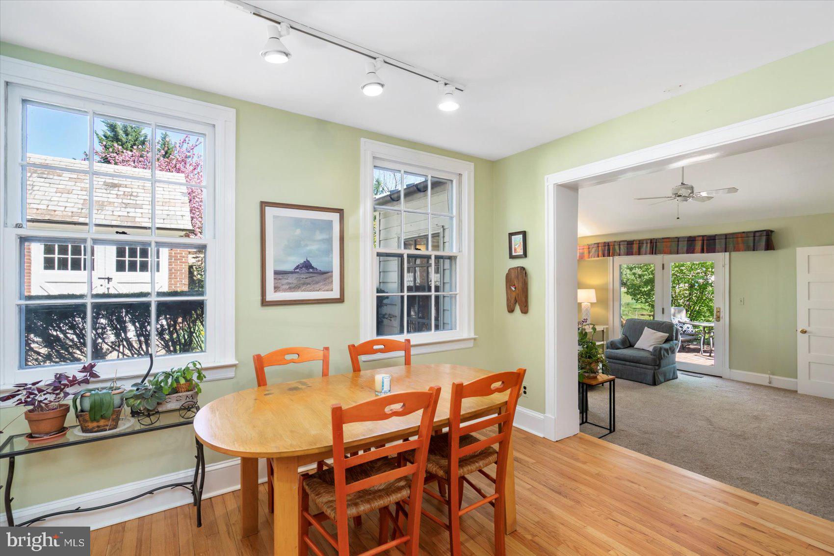 600 Somerset Road Baltimore, MD 21210 - Photo 19 of 59 a view of a dining room with furniture window and wooden floor