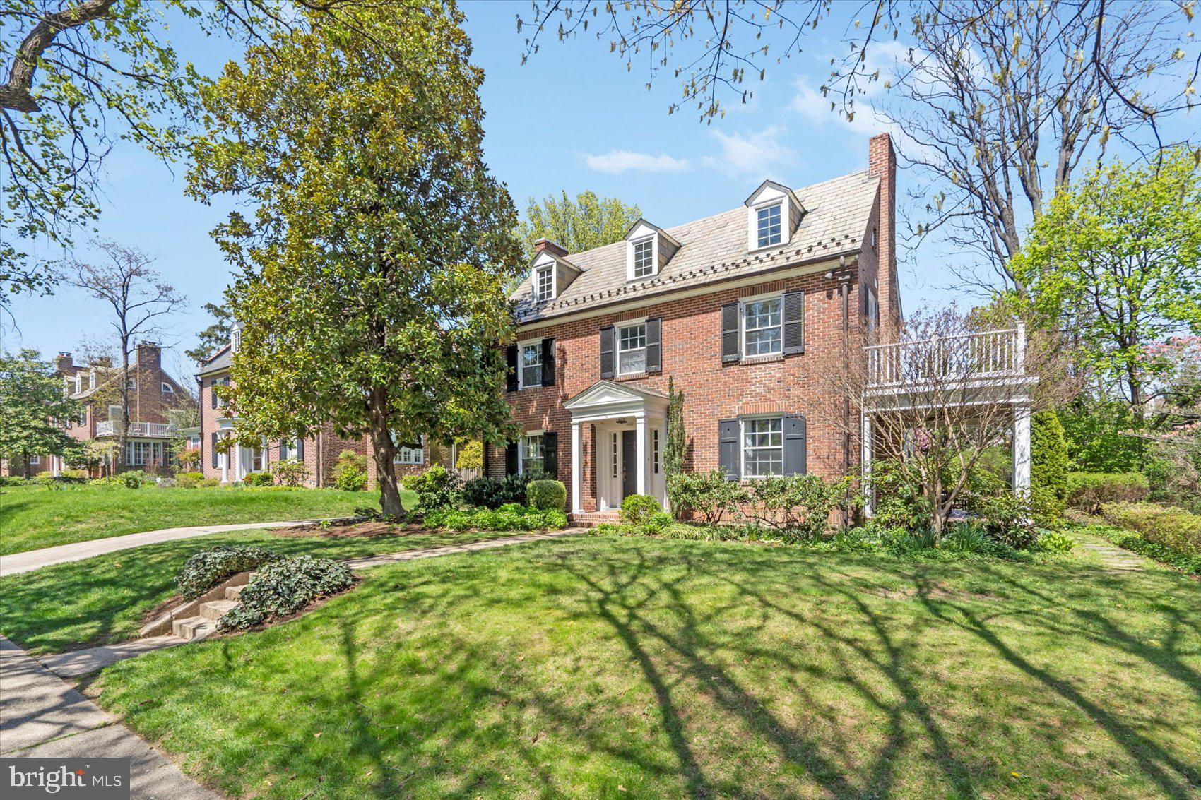600 Somerset Road Baltimore, MD 21210 - Photo 2 of 59 a front view of house with yard and trees around