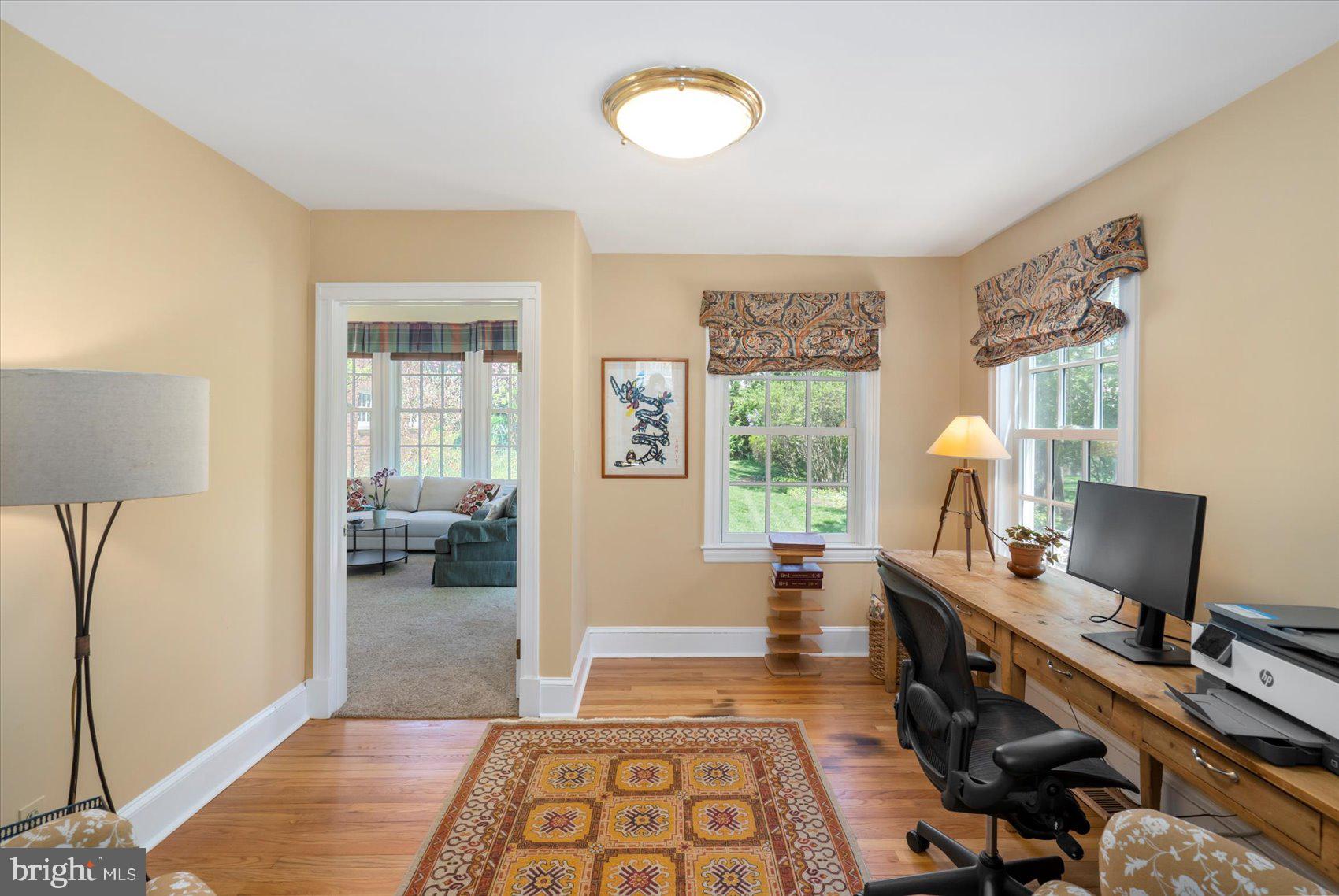 600 Somerset Road Baltimore, MD 21210 - Photo 25 of 59 a workspace with furniture and a window