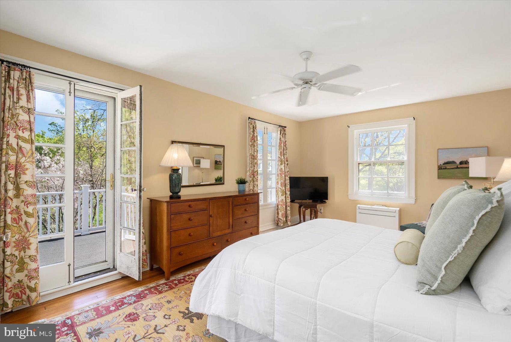 600 Somerset Road Baltimore, MD 21210 - Photo 30 of 59 a bedroom with a large bed and a window