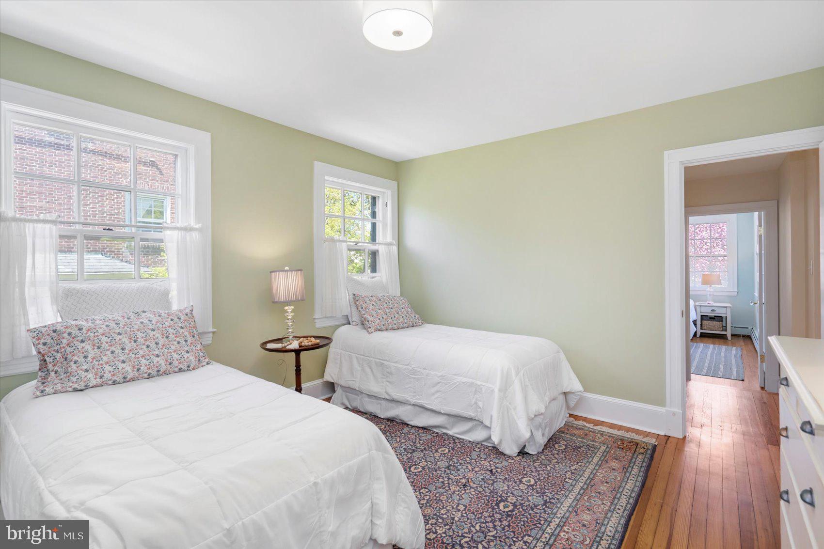 600 Somerset Road Baltimore, MD 21210 - Photo 36 of 59 a bedroom with two beds and a large window