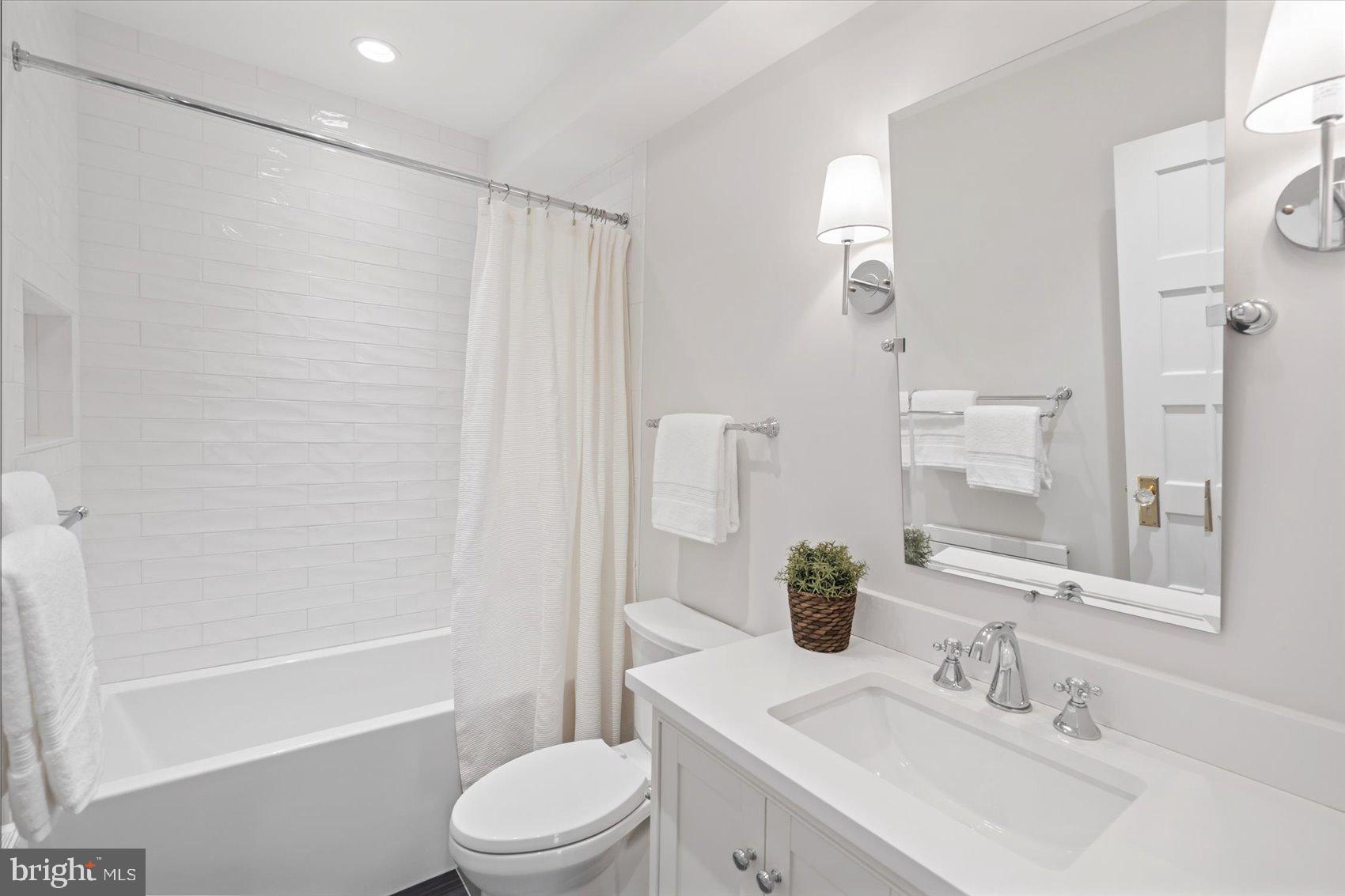 600 Somerset Road Baltimore, MD 21210 - Photo 40 of 59 a bathroom with a sink toilet and shower