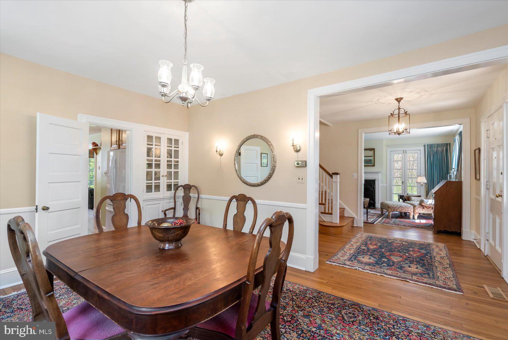 600 Somerset Road Baltimore, MD 21210 - Photo 9 of 59 a view of a dining room with furniture window and wooden floor