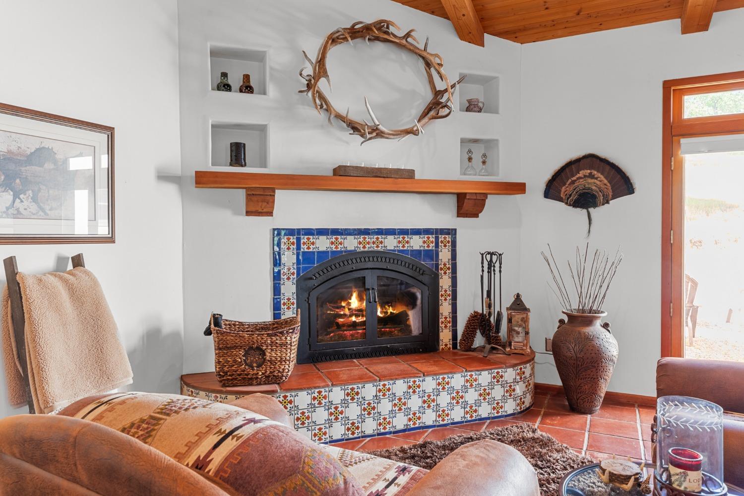 a bedroom with a bed and a fireplace