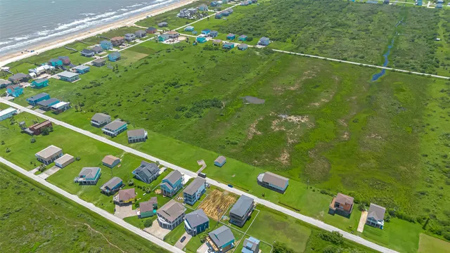 a view of a swimming pool and an outdoor seating