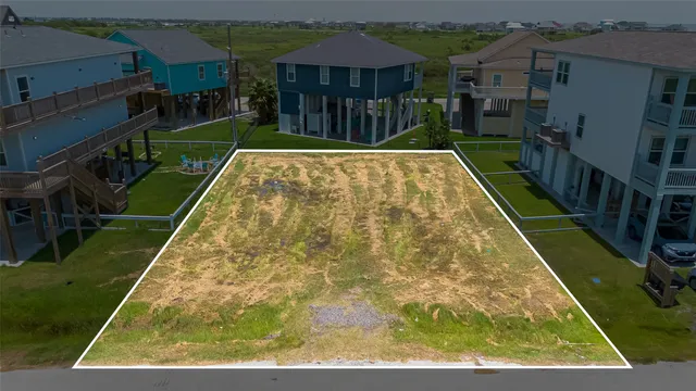 a view of yard with patio