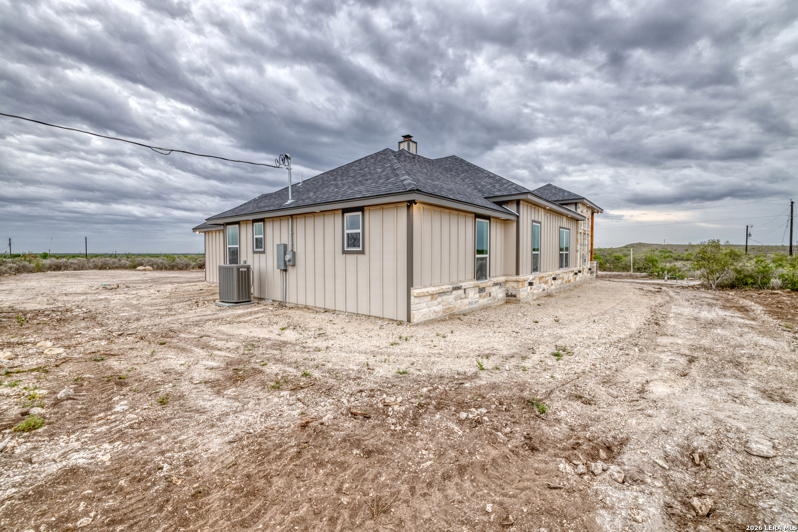 22 Greystone Hills Uvalde, TX 78801 - Photo 12 of 68 a view of a house with a yard